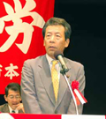 あいさつする平野民主党大阪府連代表の写真フ